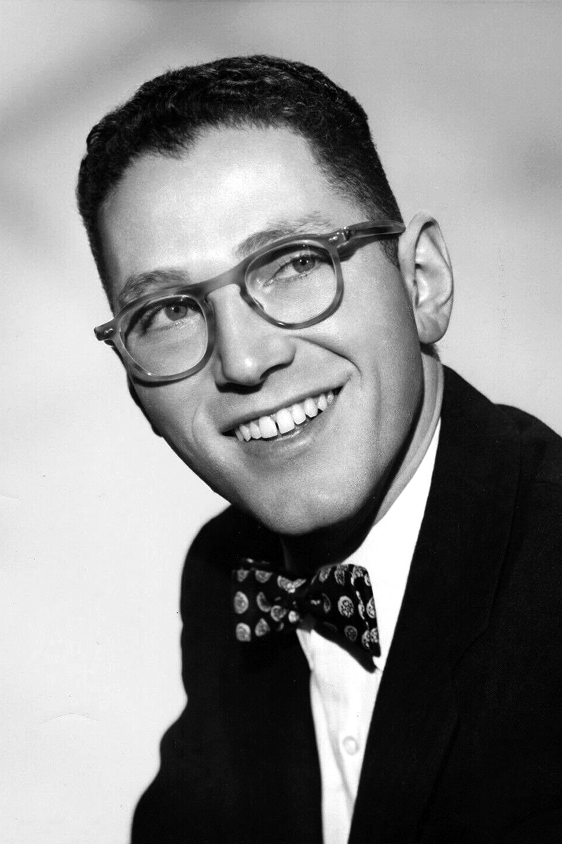 Picture of Tom Lehrer. This work is in the public domain in the United States because it was published in the United States between 1927 and 1977, inclusive, without a copyright notice